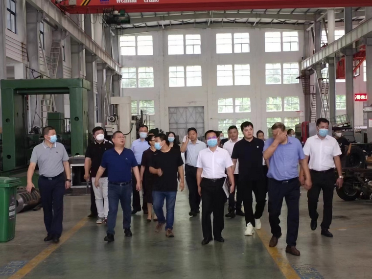 信陽市委常委、副市長李俊協(xié)同中國國際經濟技術合作促進會考察團來廠考察指導